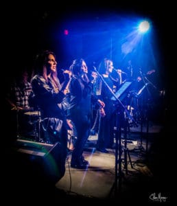 3 female musicians performing on stage at the Tralf Music Hall